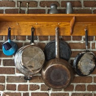 Pots and pans in a kitchen to illustrate what's the best pan for baking brownies