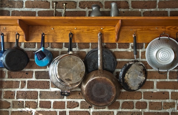 Pots and pans in a kitchen to illustrate what's the best pan for baking brownies