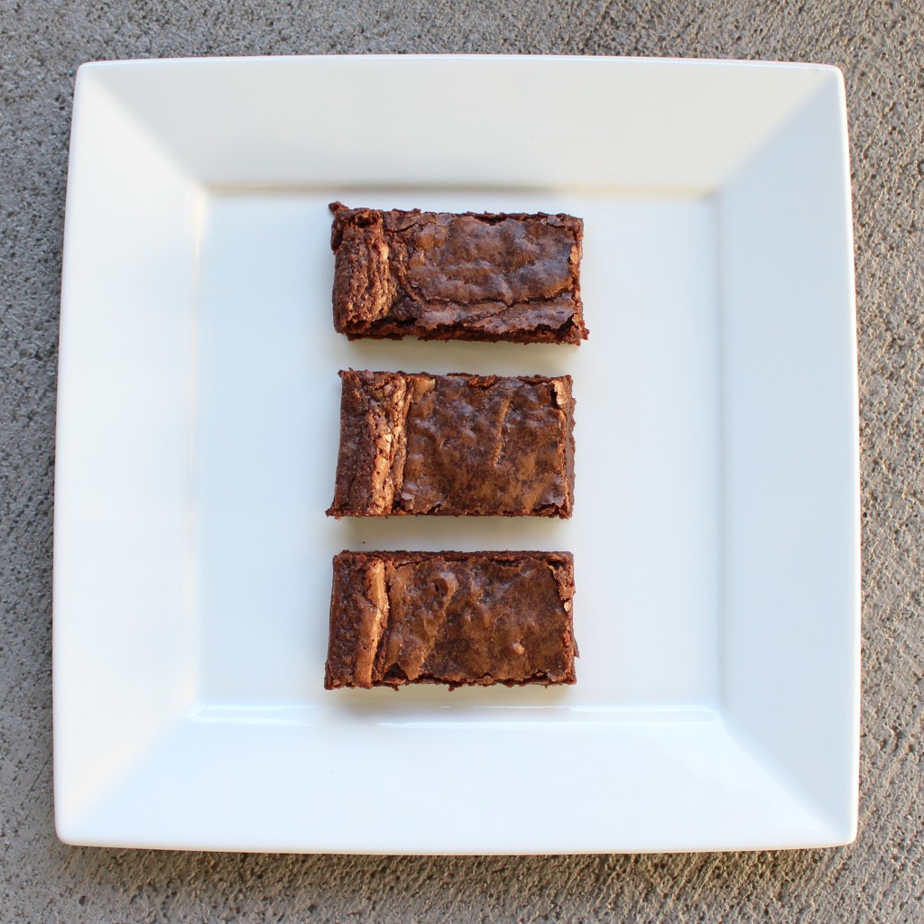 85% chocolate brownies on a white square plate