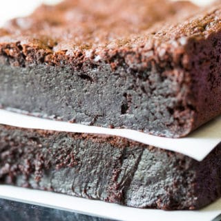 You'll love these decadent flourless brownies! Made with absolutely no flour of any kind, they are brimming with intense chocolate flavor and fudginess.