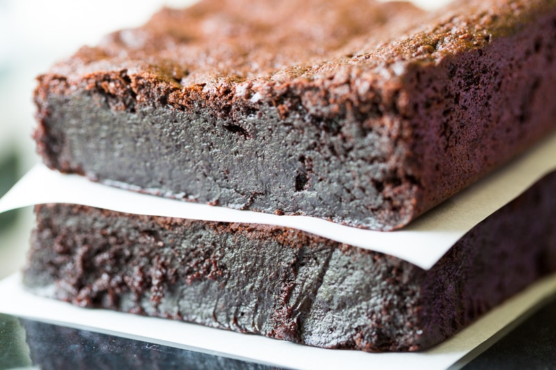 You'll love these decadent flourless brownies! Made with absolutely no flour of any kind, they are brimming with intense chocolate flavor and fudginess.