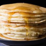 Make pancakes from scratch with this simple and easy recipe. They're fluffy, tasty, more delicious than a box mix, and just as easy to make!