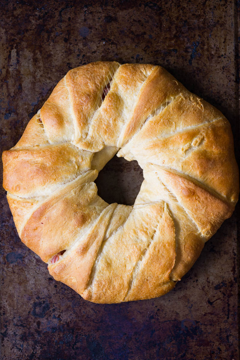 This Ploughman's Lunch Crescent Roll Ring takes the traditional ploughman's lunch and gives it a twist, combining ham, English cheese, and chutney in a delicious crescent roll ring.