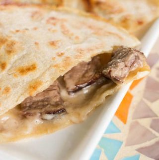 If you've never used corn tortillas to make steak quesadillas, you're in for a treat! This steak quesadilla recipe is super easy and so delicious.