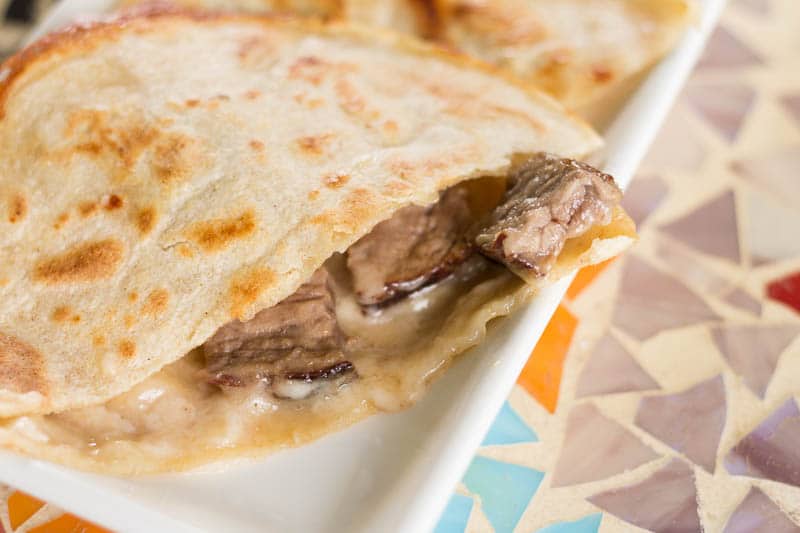 If you've never used corn tortillas to make steak quesadillas, you're in for a treat! This steak quesadilla recipe is super easy and so delicious.