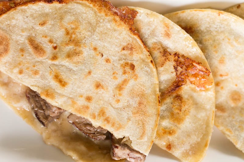 If you've never used corn tortillas to make steak quesadillas, you're in for a treat! This steak quesadilla recipe is super easy and so delicious.