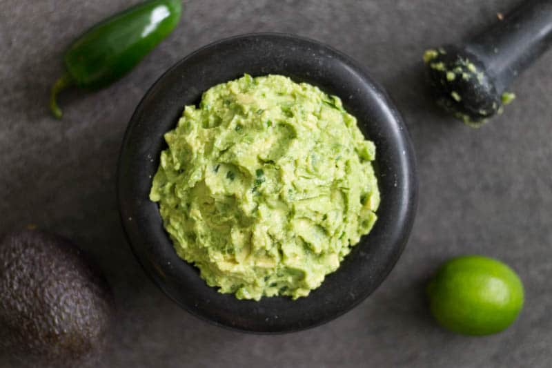 This spicy guacamole recipe is made with fresh avocados, jalapenos, lime juice, and sea salt. It's perfect for guacamole lovers who love a little heat!