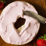 Make your own strawberry flavored cream cheese with this strawberry cream cheese recipe! All you need is three ingredients and a food processor or blender.