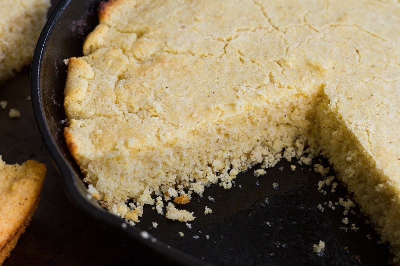 This classic Southern cast iron skillet cornbread is my mother's recipe. You'll love the savory buttermilk flavor and the deliciously crunchy crust!