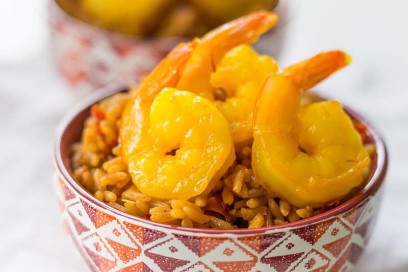 Sauteed saffron shrimp are a beautiful yellow color with a delectable flavor. Ready in just minutes with a simple white wine and saffron marinade!