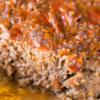 Slice of ketchup glazed meatloaf without eggs