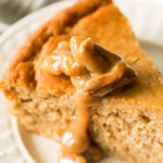 Caramel Butter Pecan Topping on Applesauce Cake (Gluten Free) on a white plate