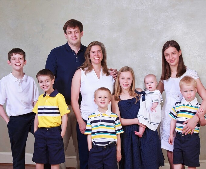 The Cook Family of Cooking with 7 Kids - Mother, father, and seven children