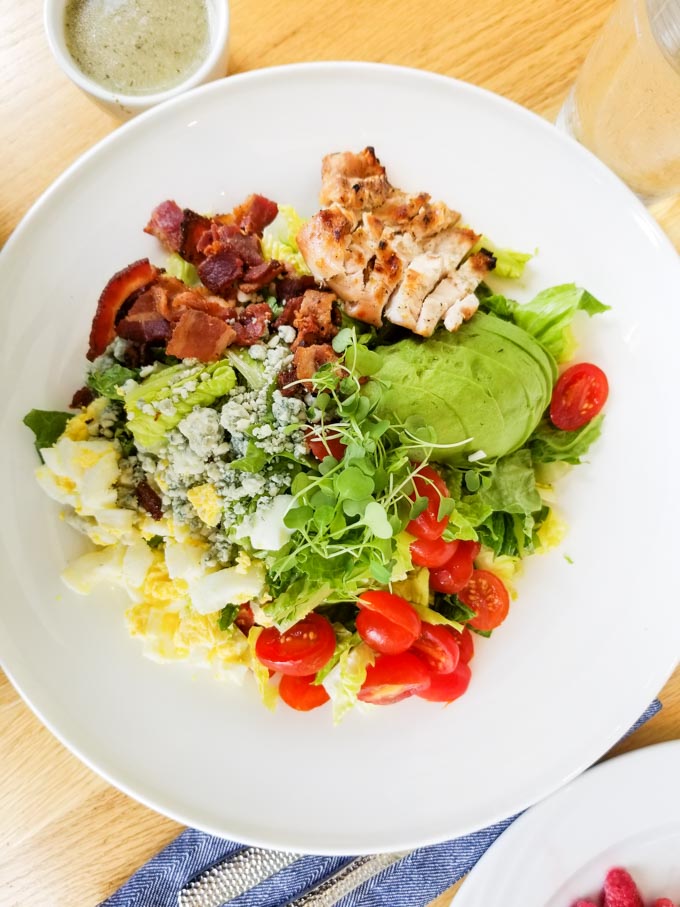 Gluten free Cobb salad on a white plate at LakeHouse restaurant