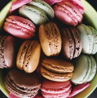 Macaron cookies in a bowl to illustrate if macarons are gluten free