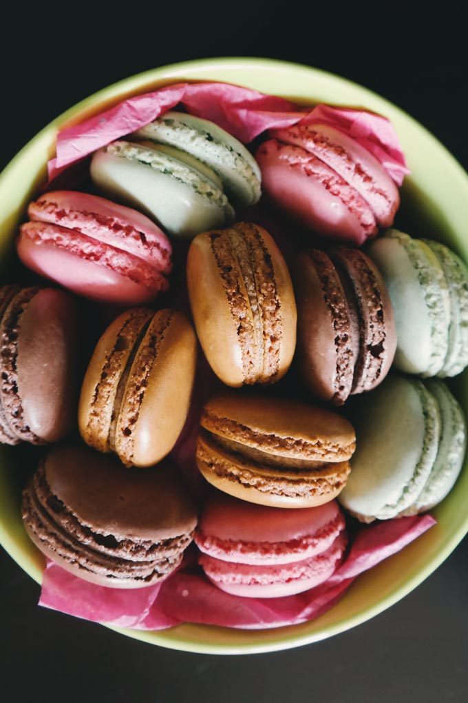 Macaron cookies in a bowl to illustrate if macarons are gluten free