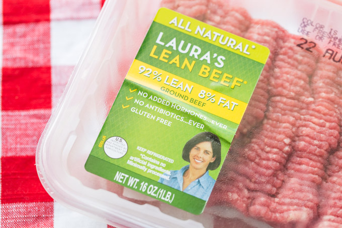 Package of Laura's Lean Beef on a red checked tablecloth