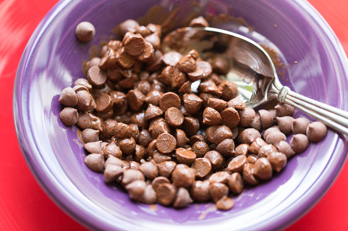 Chocolate chips starting to melt in a bowl